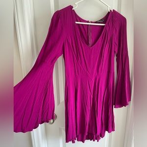 Magenta dress with bell sleeves. Light material. Excellent condition.